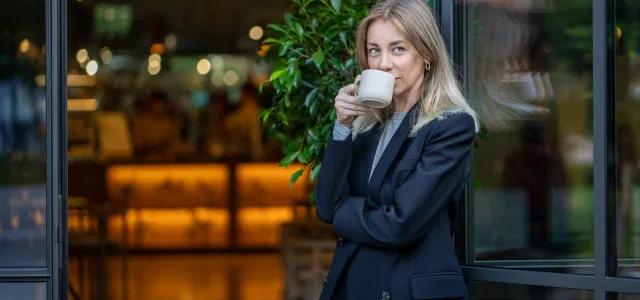 Young woman drinking coffee